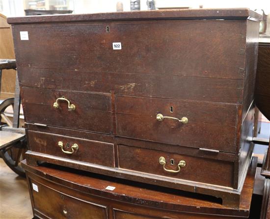 An antique oak drop front oak coffer W.92cm